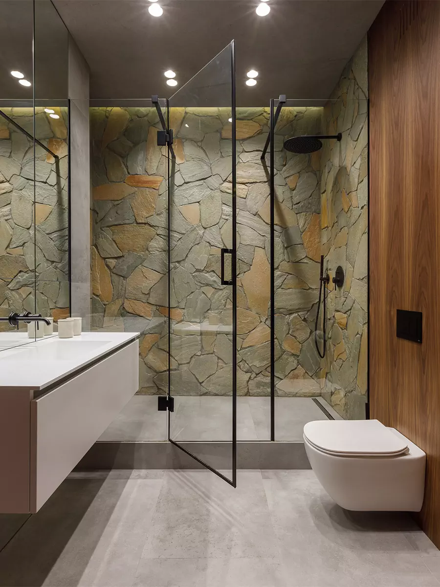 Акценты из природного камня в брутальном интерьере для холостяка — проект QUADRUM Studio