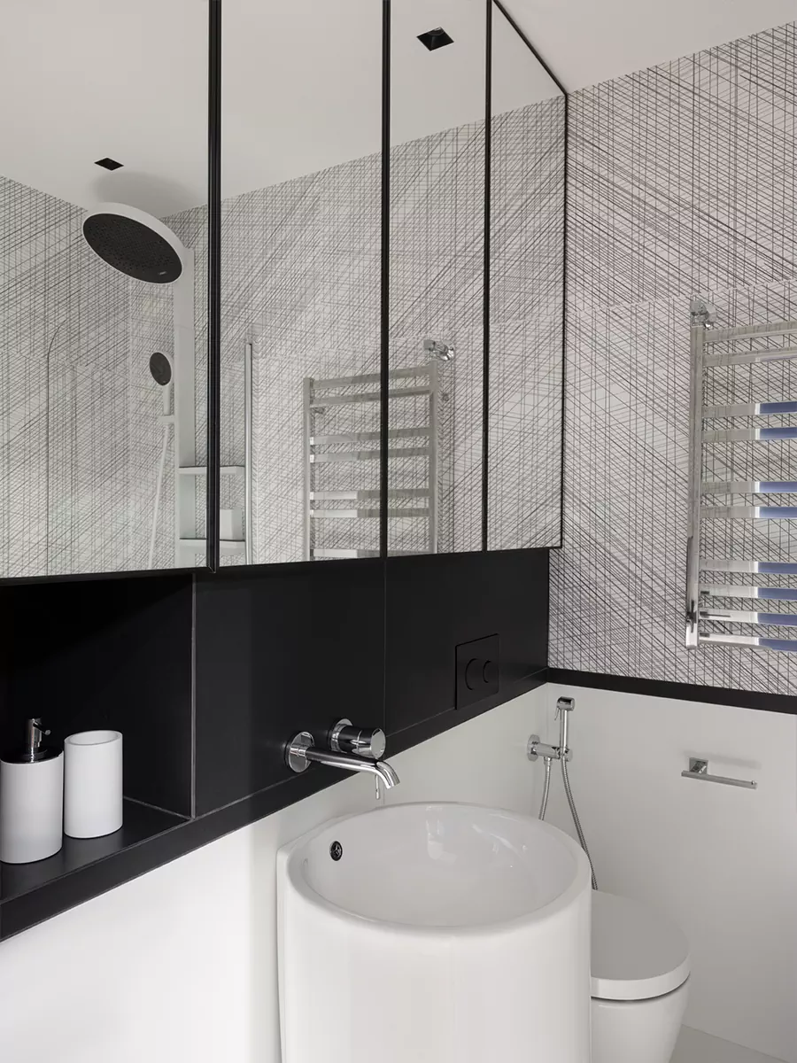 Строгое рифление и бордовые акценты в интерьере небольшой квартиры для девушки – проект Владимира Любарски